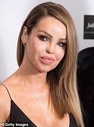 How tall is Katie Piper?